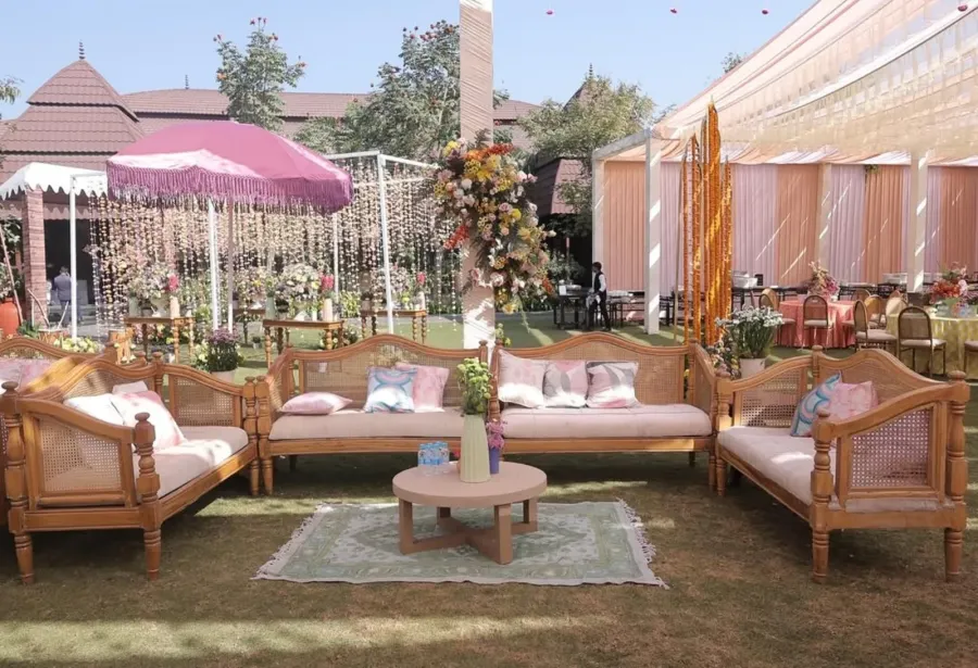 Garden lounge with parasols and pastel seating