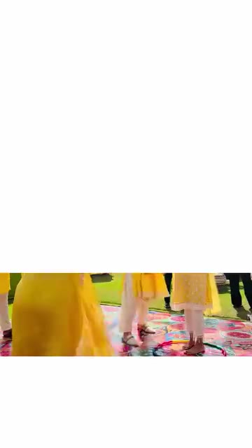 Haldi ceremony décor in bright yellow and fresh blooms